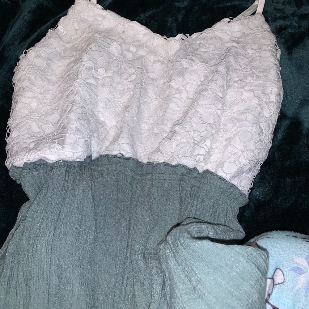 A white and green jumpsuit